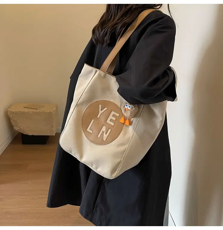 Women's Black Yellow Leather Tote Bag with Cute Charm — feature 9