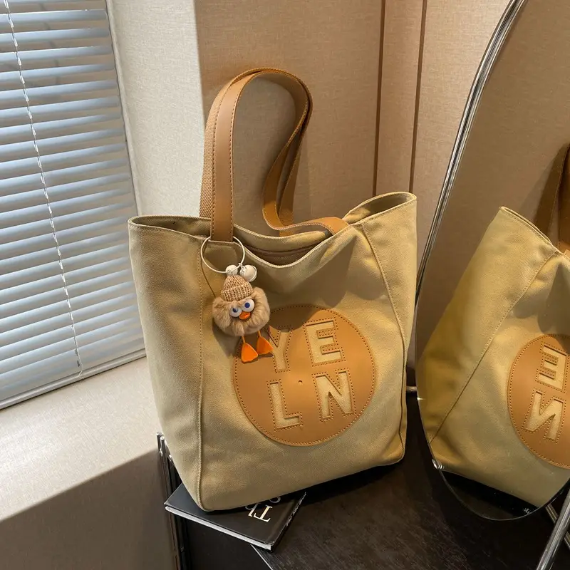 Women's Black Yellow Leather Tote Bag with Cute Charm - Image 2