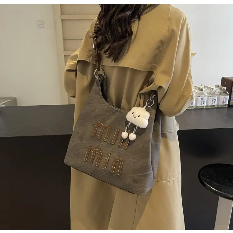 Women's Grey M-Logo Shoulder Bag with Cute Charm — feature 46