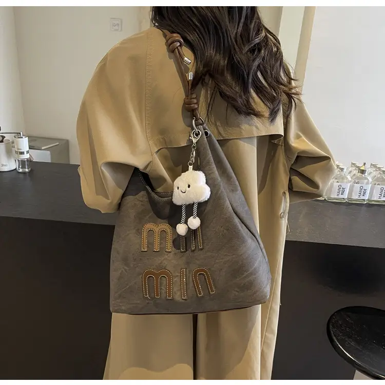 Women's Grey M-Logo Shoulder Bag with Cute Charm — feature 49