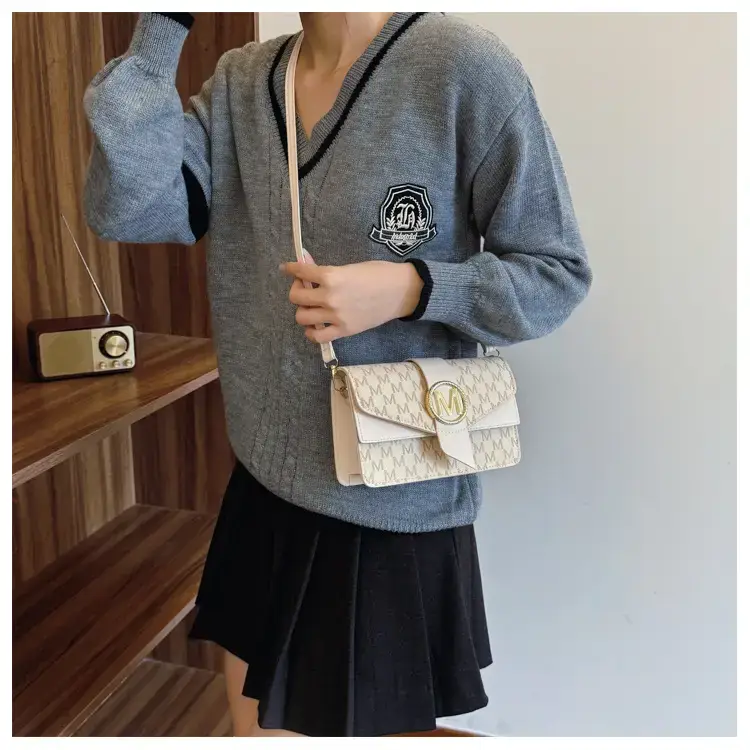 Women's Black Monogram Shoulder Bag with Gold Logo — feature 12