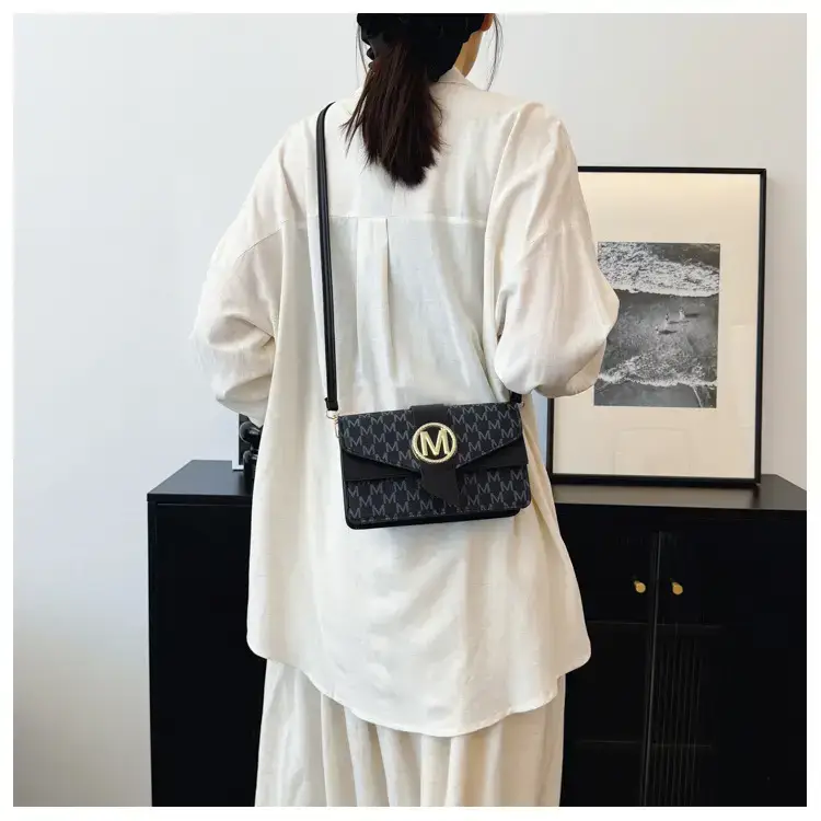 Women's Black Monogram Shoulder Bag with Gold Logo — feature 17