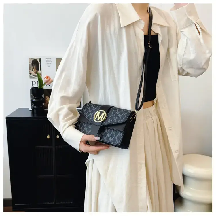 Women's Black Monogram Shoulder Bag with Gold Logo — feature 18