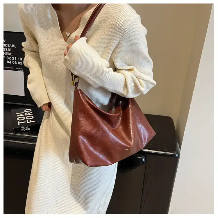 Brown Leather Drawstring Shoulder Bag for Women — feature 40