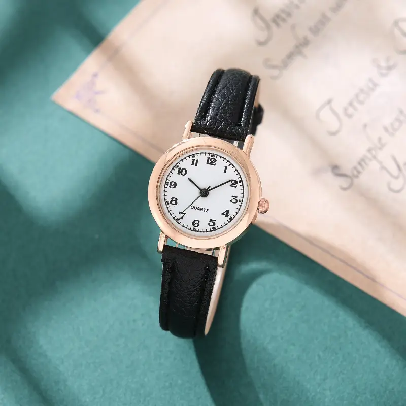 Women's Rose Gold Watch with Black Leather Band — feature 2