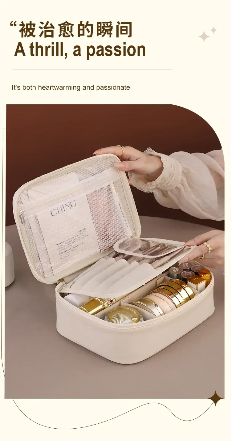 Close view of open cream case with mesh lid pocket and divided interior.