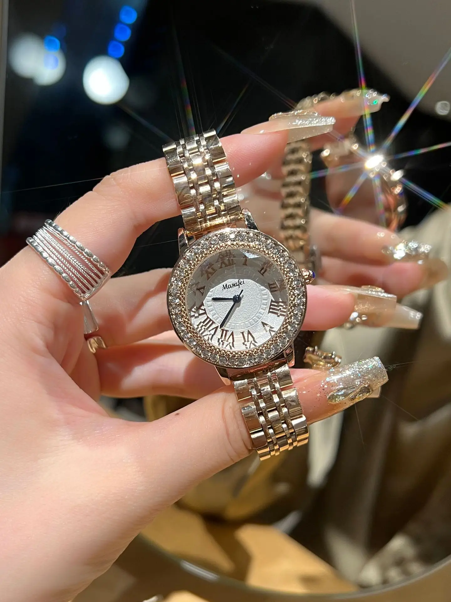 Luxury Women's Roman Dial Watch with Diamond Strap — feature 1