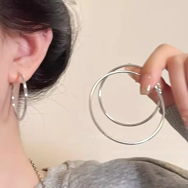 S925 silver needle European and American exaggerated plain ring earrings women's high-end light luxury Joker simple temperament earrings wholesale