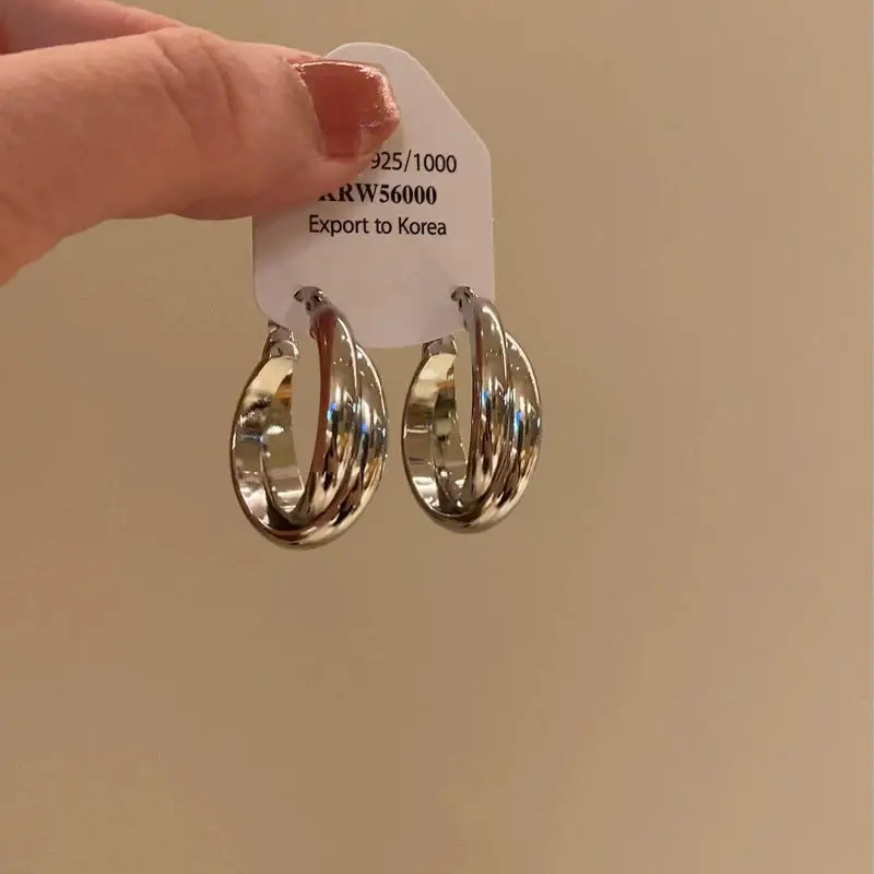 S925 silver needle European and American exaggerated plain ring earrings women's high-end light luxury Joker simple temperament earrings wholesale