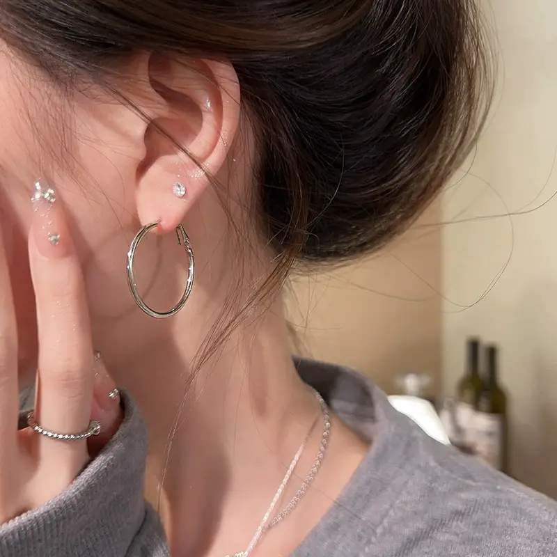 S925 silver needle European and American exaggerated plain ring earrings women's high-end light luxury Joker simple temperament earrings wholesale