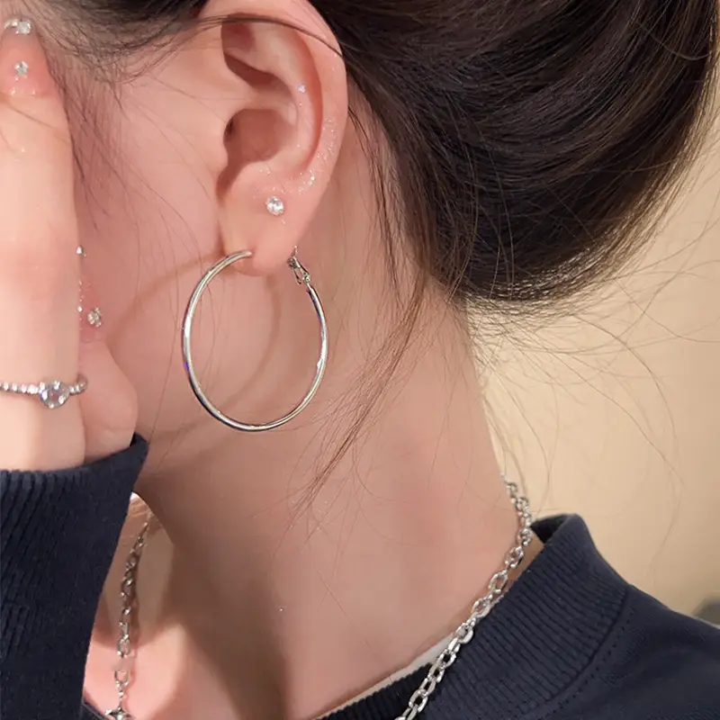 S925 silver needle European and American exaggerated plain ring earrings women's high-end light luxury Joker simple temperament earrings wholesale