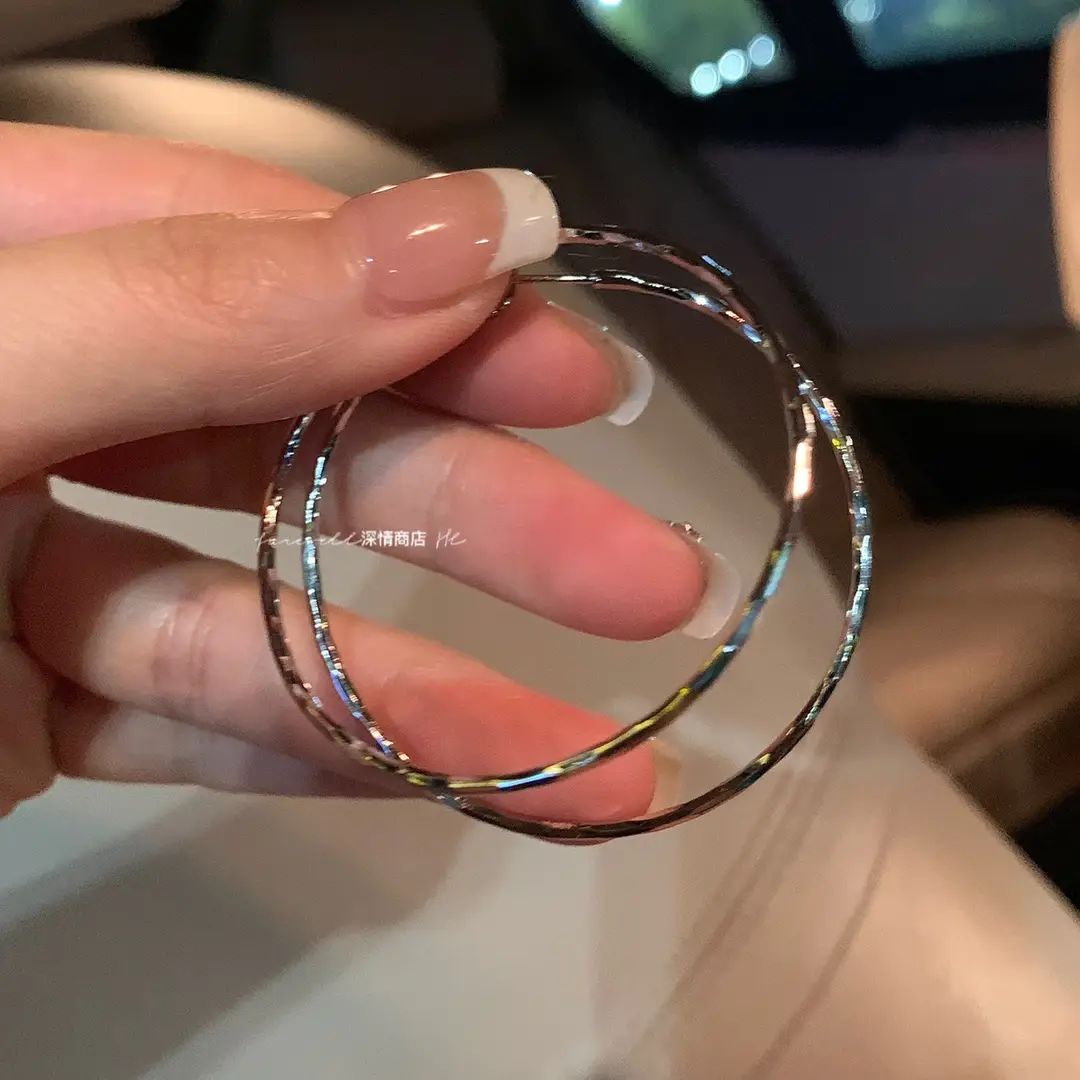 S925 silver needle European and American exaggerated plain ring earrings women's high-end light luxury Joker simple temperament earrings wholesale
