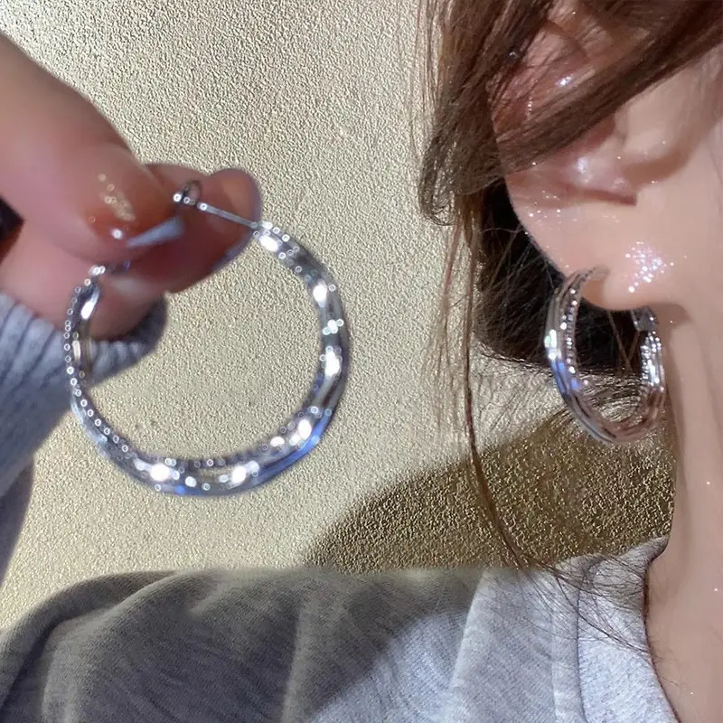 S925 silver needle European and American exaggerated plain ring earrings women's high-end light luxury Joker simple temperament earrings wholesale