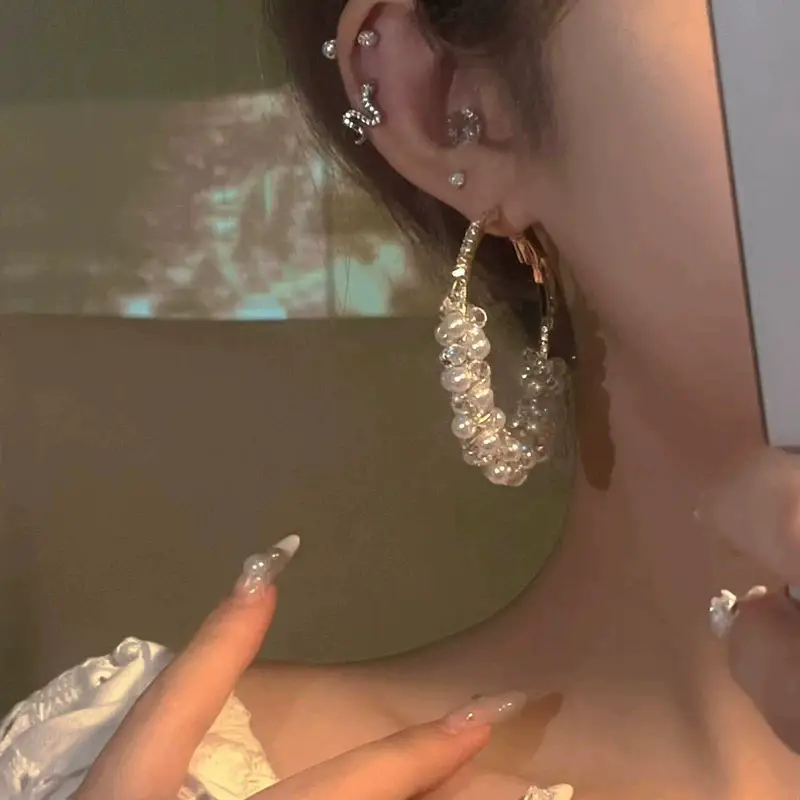 S925 silver needle European and American exaggerated plain ring earrings women's high-end light luxury Joker simple temperament earrings wholesale