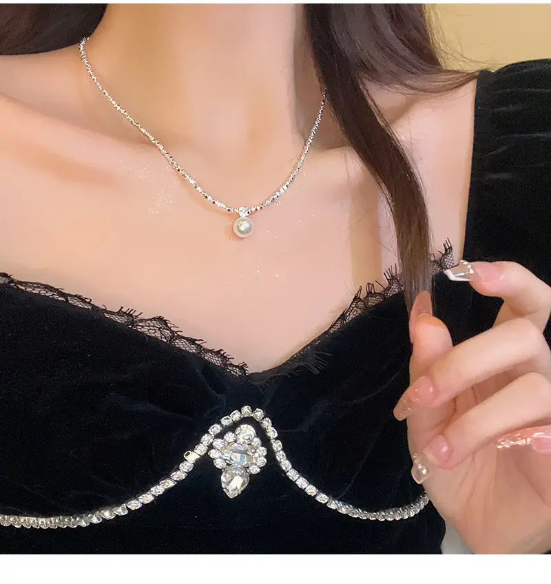 Feminine Pearl Clavicle Necklace with Broken Silver Finish — feature 1