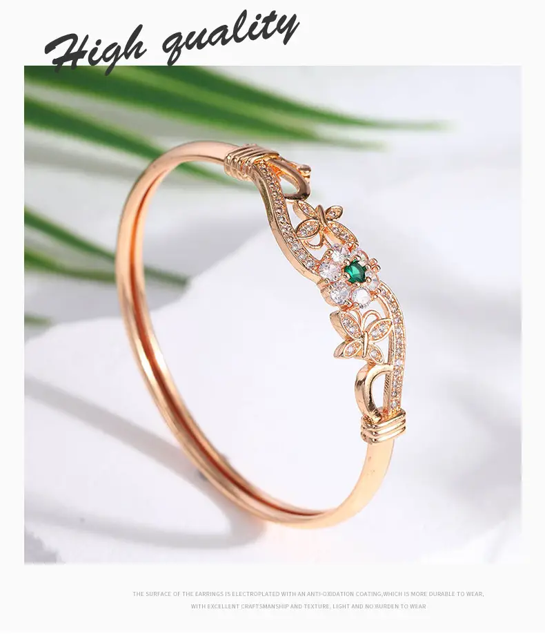 Hollow Butterfly Bracelet with Diamond & Green Stones — feature 3