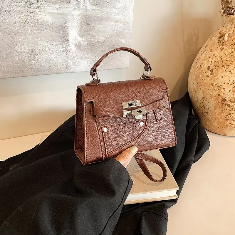 White Kelly Shoulder Bag with Litchi Clasp - Image 8