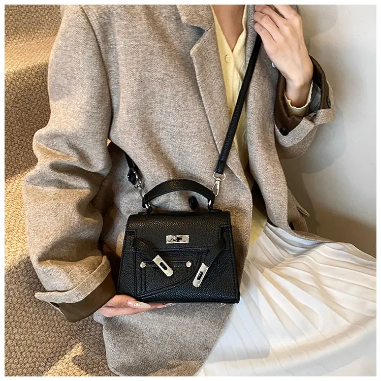 White Kelly Shoulder Bag with Litchi Clasp — feature 13