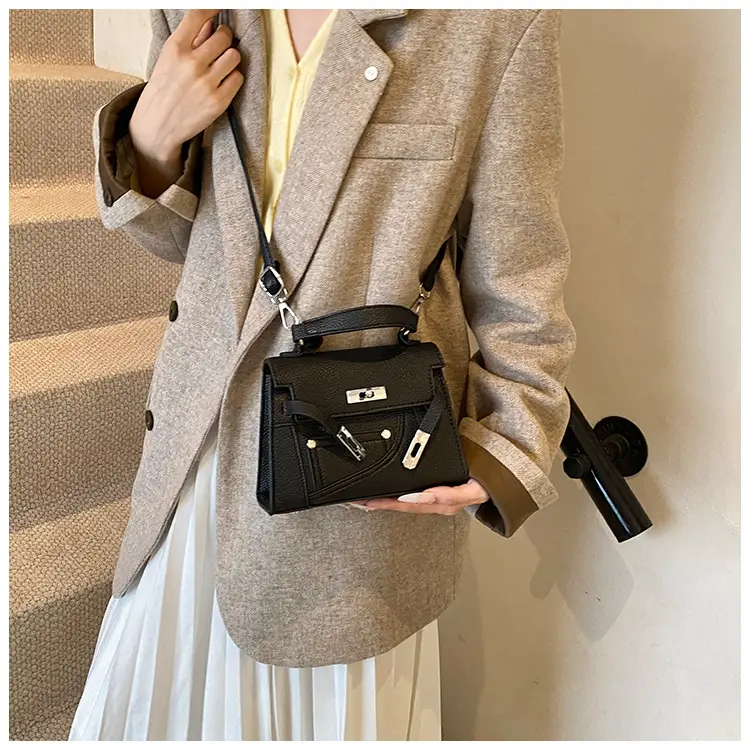 White Kelly Shoulder Bag with Litchi Clasp — feature 14