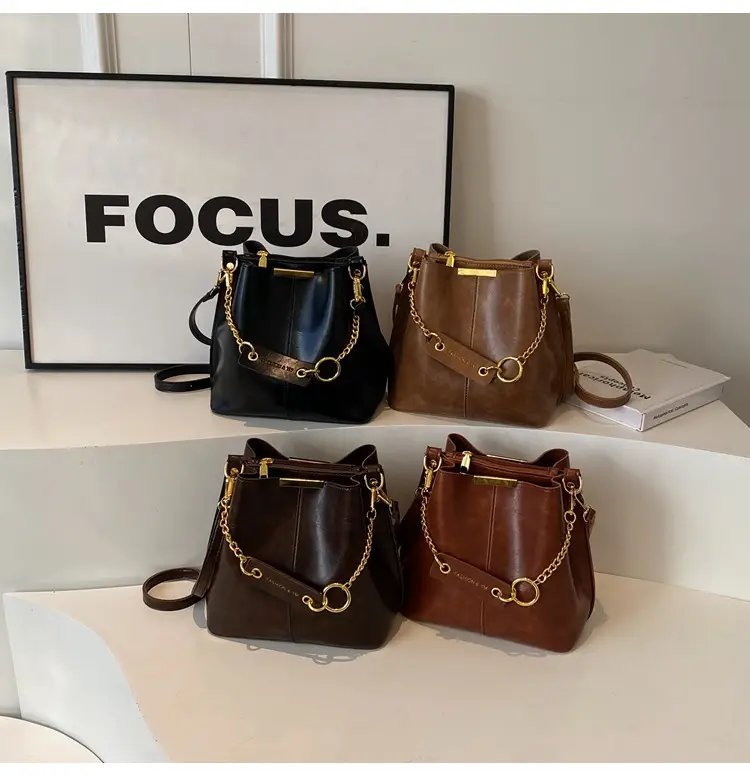 2026 Black Crossbody Bag with Gold Chain — feature 1