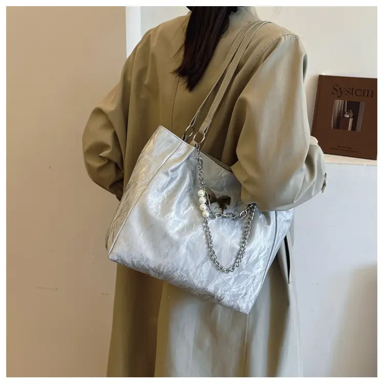 Women's Creamy Cloud Handbag with Chain Accessory — feature 9