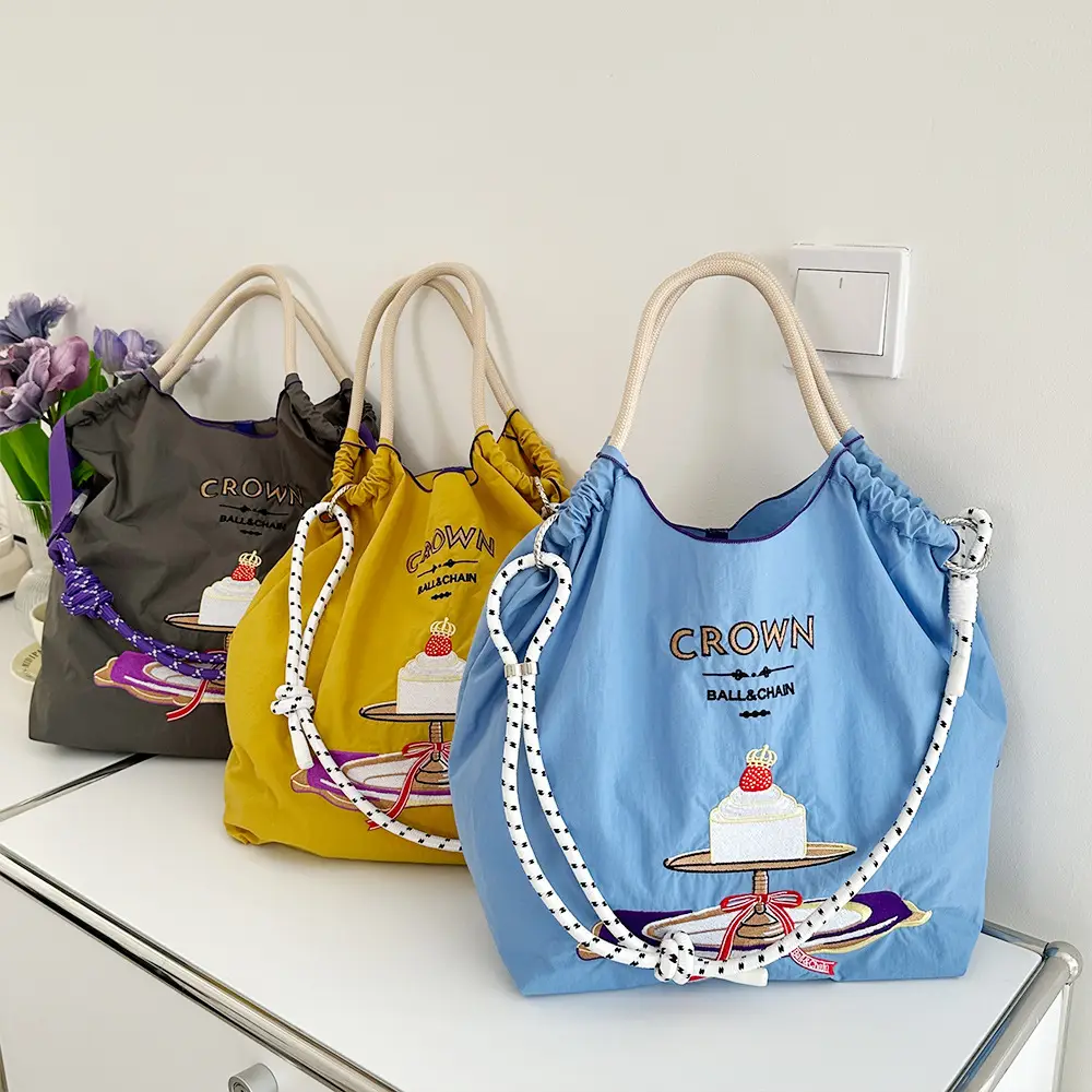 Crown Ball Raceman Embroidered Blue Handbag — feature 5