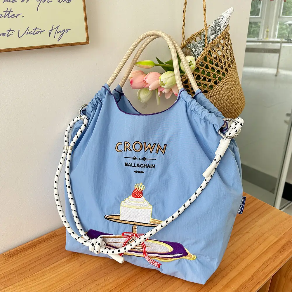Crown Ball Raceman Embroidered Blue Handbag — feature 6