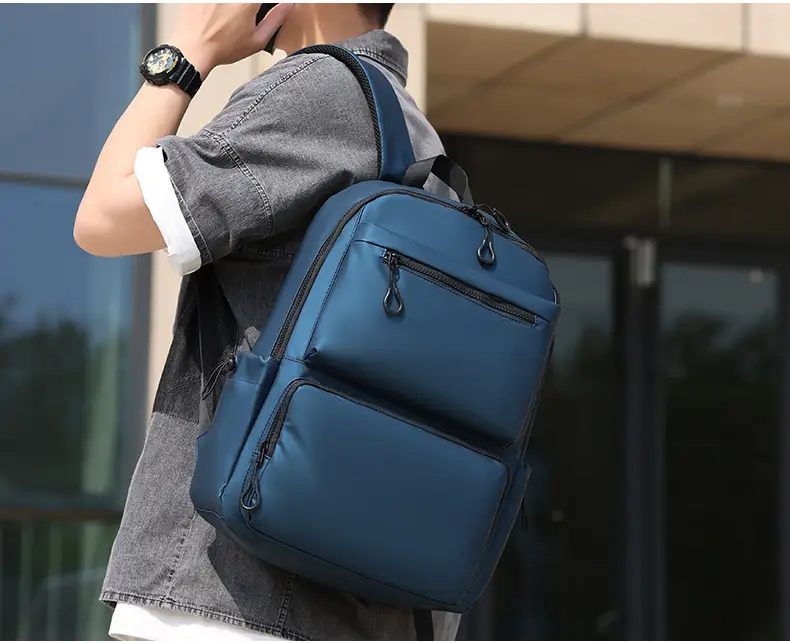 Cross-Border Leather Film Solid Color Computer Bag Casual Casual Multi-Layer Pocket Large Capacity Backpack 15.6inch Notebook Bag — feature 17