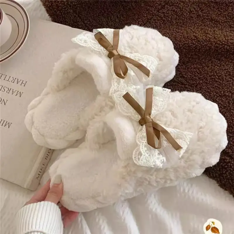 Men and women's indoor warm winter moon shoes Korean fairy style bow fashion new couple cotton slippers