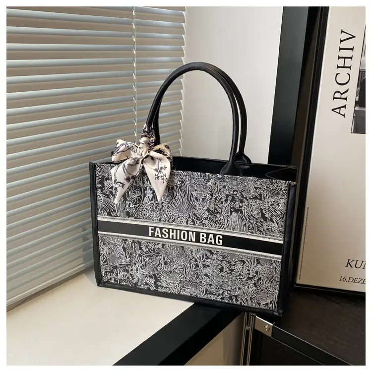 Women's Black Embroidered Crossbody Bag with Bow — feature 9