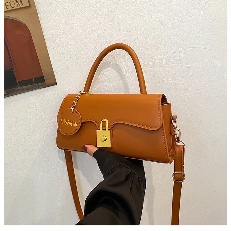 Black Crossbody Bag with Gold Lock for Women 2024 — feature 33