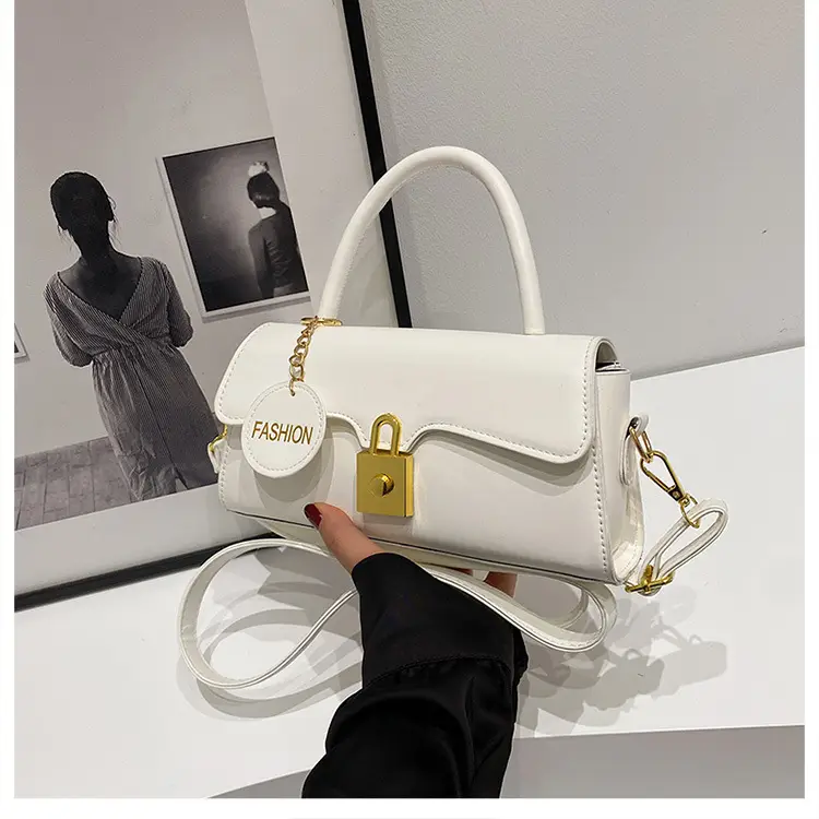 Black Crossbody Bag with Gold Lock for Women 2024 — feature 39