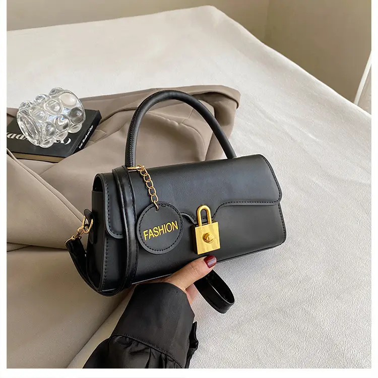 Black Crossbody Bag with Gold Lock for Women 2024 — feature 40