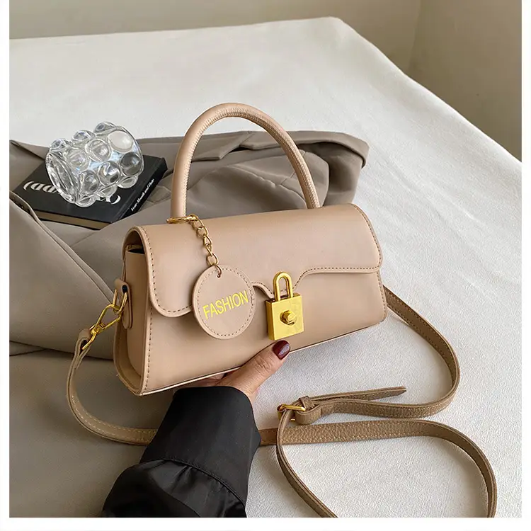 Black Crossbody Bag with Gold Lock for Women 2024 — feature 41