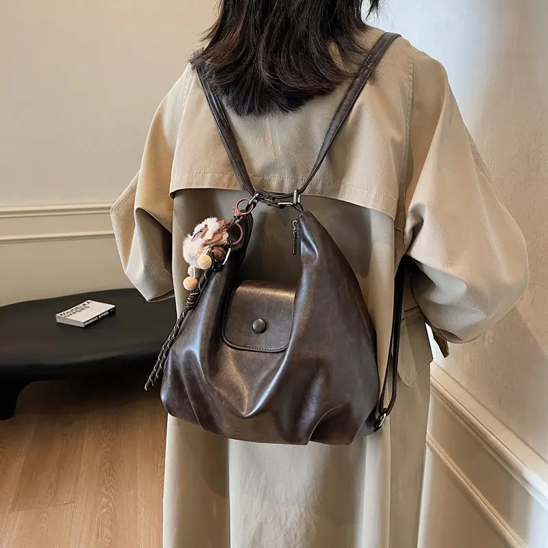 Women's Large Brown Leather Shoulder Bag with Pom Pom Charm - Image 6