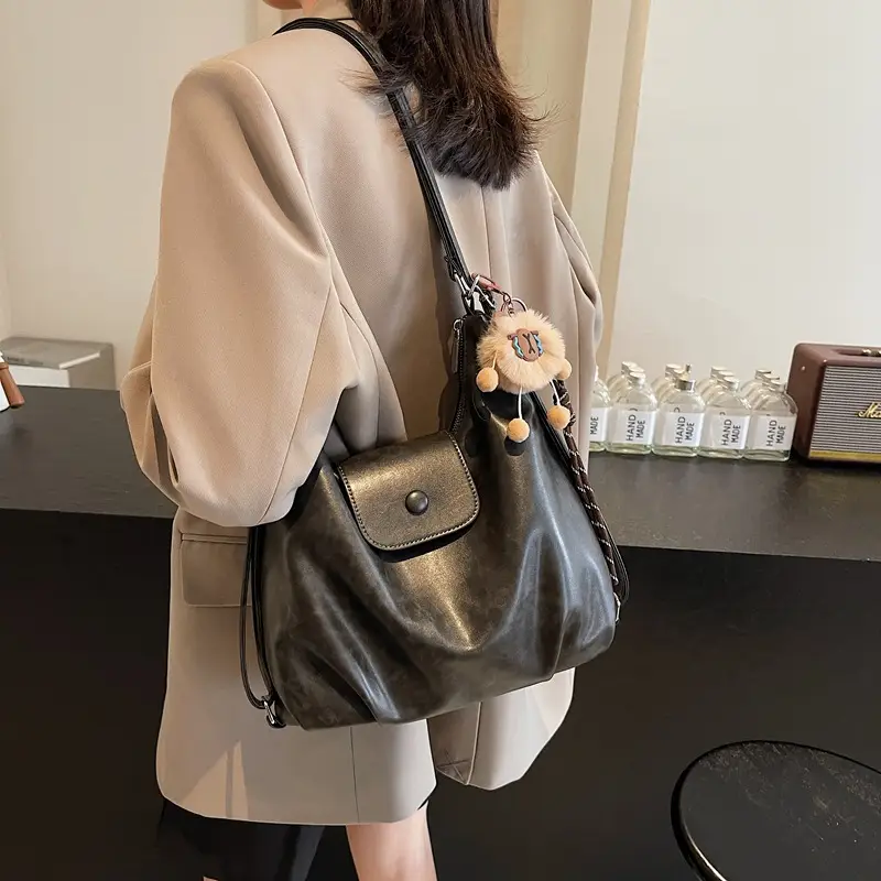 Women's Large Brown Leather Shoulder Bag with Pom Pom Charm - Image 7