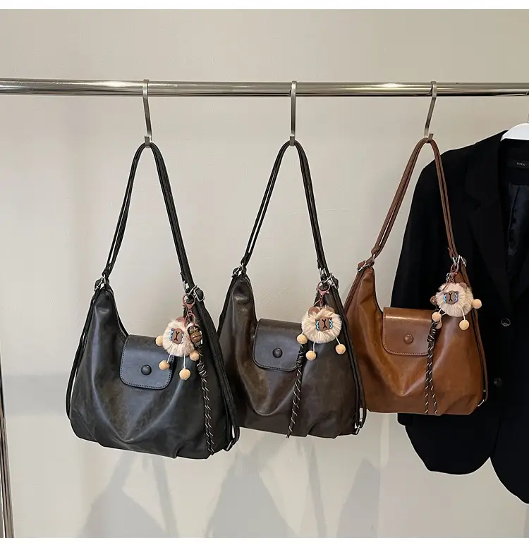 Women's Large Brown Leather Shoulder Bag with Pom Pom Charm — feature 13