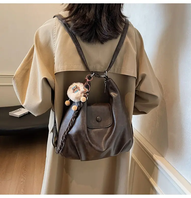 Women's Large Brown Leather Shoulder Bag with Pom Pom Charm — feature 15