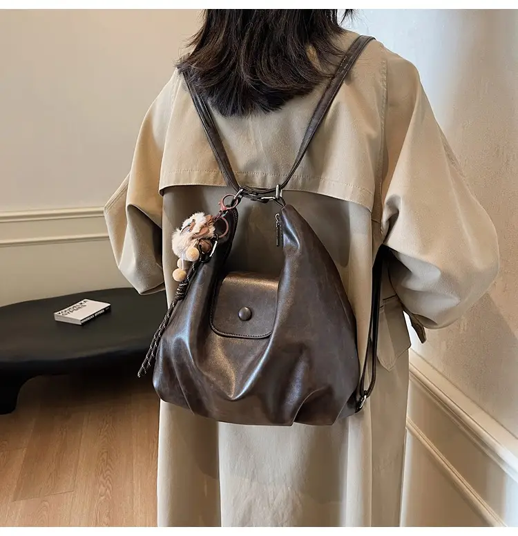Women's Large Brown Leather Shoulder Bag with Pom Pom Charm — feature 16