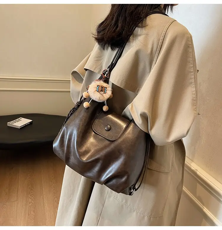 Women's Large Brown Leather Shoulder Bag with Pom Pom Charm — feature 20