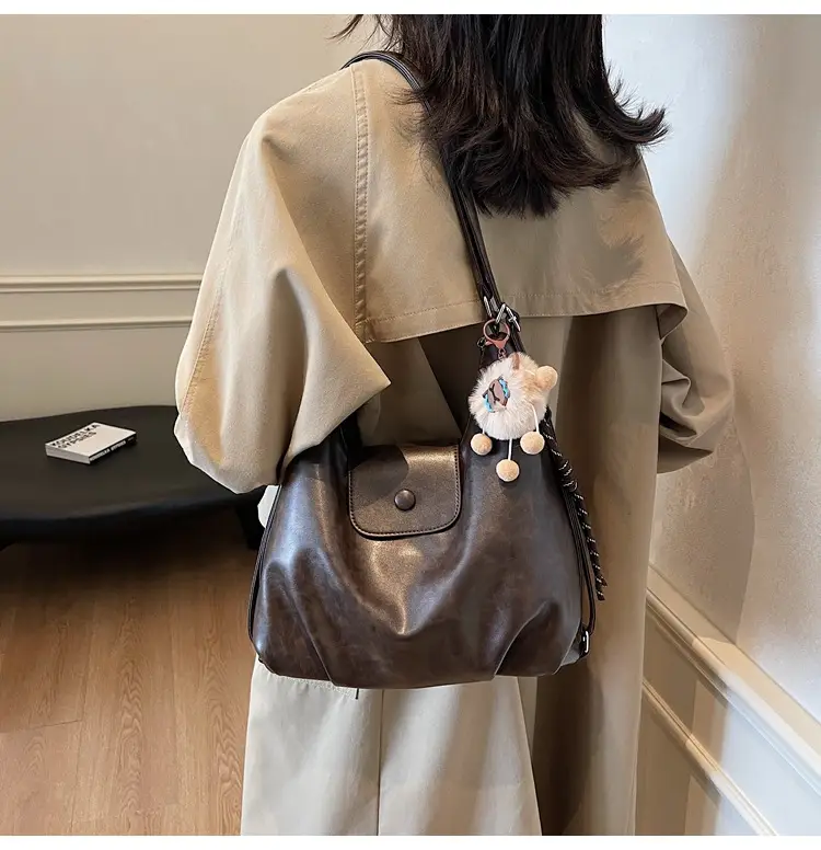 Women's Large Brown Leather Shoulder Bag with Pom Pom Charm — feature 22