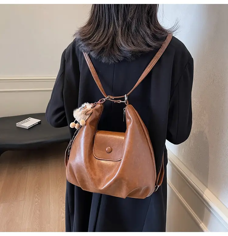 Women's Large Brown Leather Shoulder Bag with Pom Pom Charm — feature 28