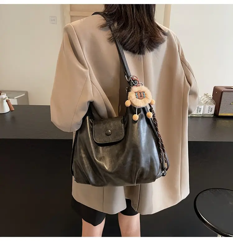 Women's Large Brown Leather Shoulder Bag with Pom Pom Charm — feature 35