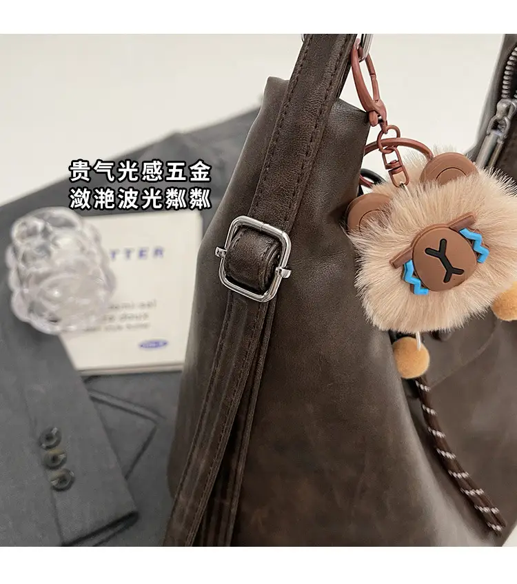Women's Large Brown Leather Shoulder Bag with Pom Pom Charm — feature 7