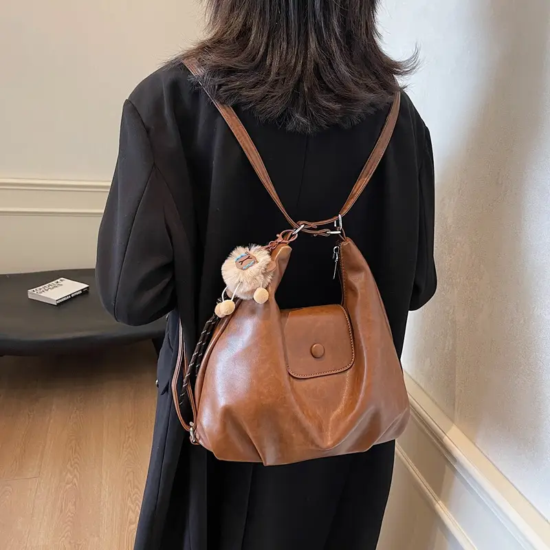 Women's Large Brown Leather Shoulder Bag with Pom Pom Charm - Image 3