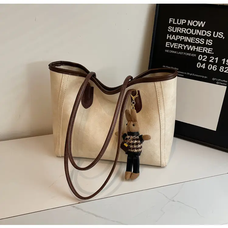 Women's Cross-Country Leather Tote Bag Cream Brown β feature 14