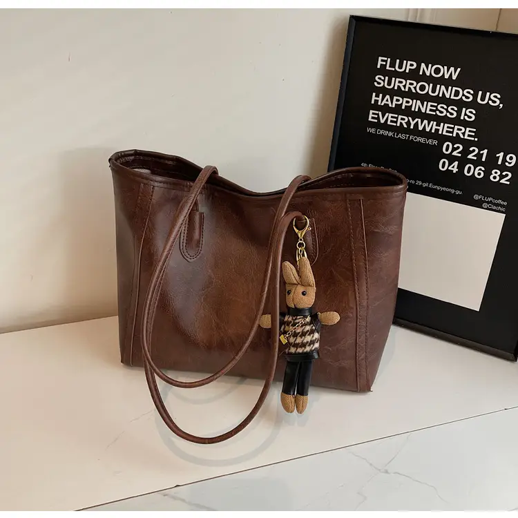 Women's Cross-Country Leather Tote Bag Cream Brown β feature 15