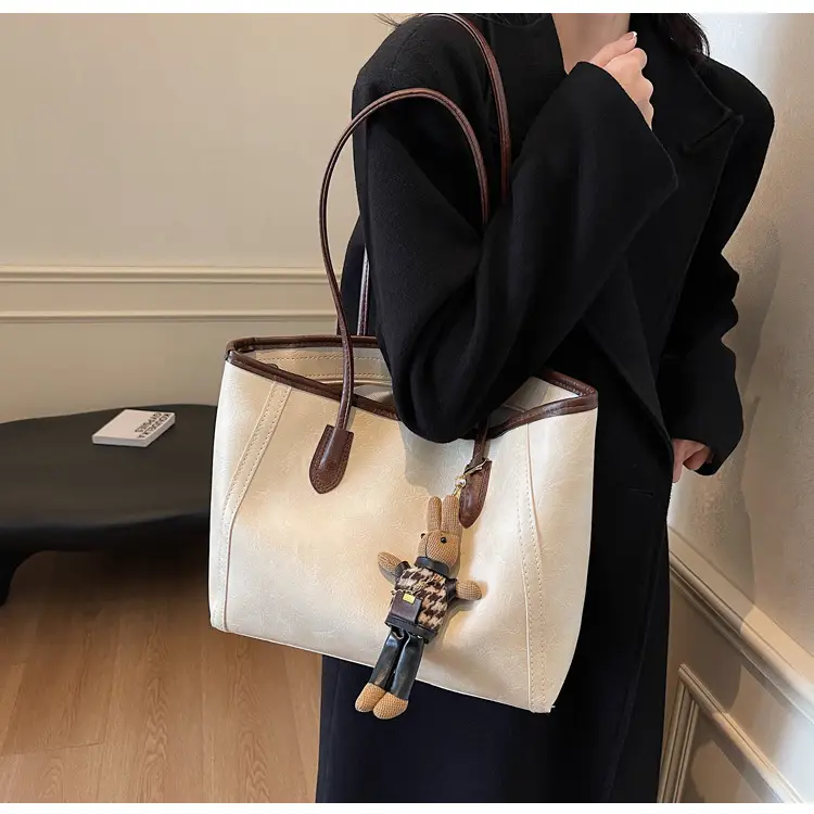 Women's Cross-Country Leather Tote Bag Cream Brown β feature 20