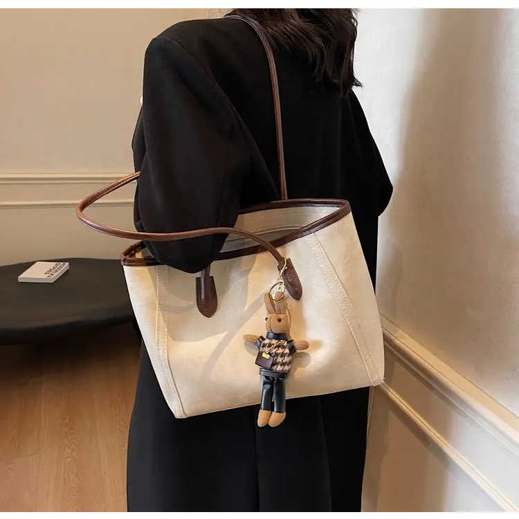 Women's Cross-Country Leather Tote Bag Cream Brown β feature 21