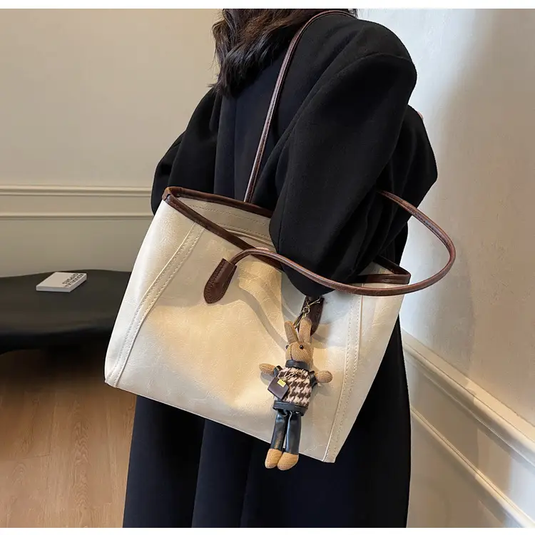 Women's Cross-Country Leather Tote Bag Cream Brown β feature 23